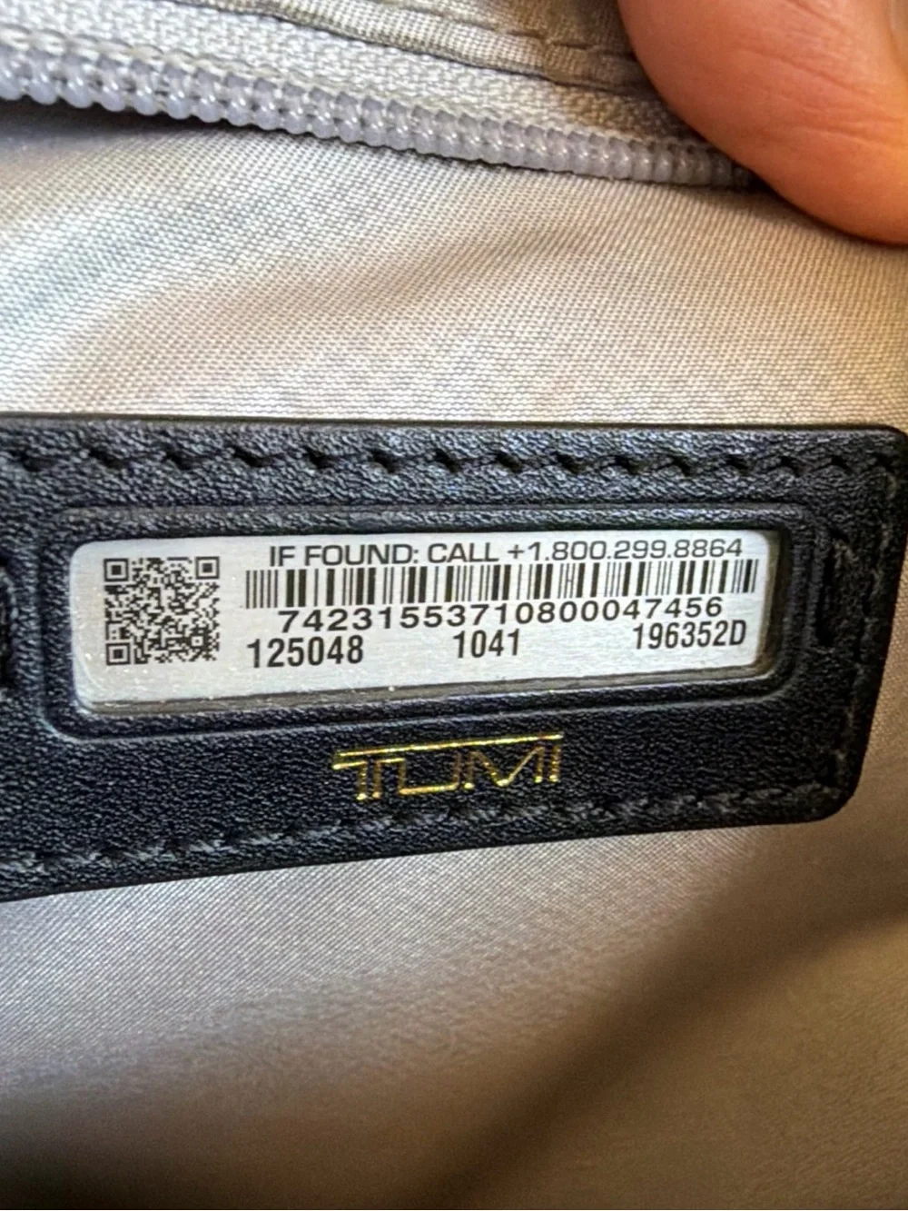 Tumi Black Duffel Bag with Gold Hardware